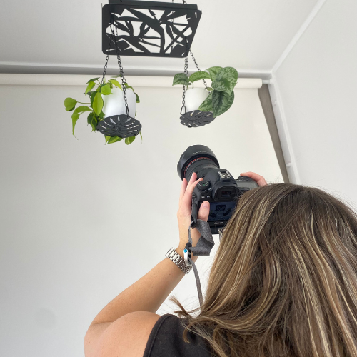 hanging rack to display multiple plants photoshoot